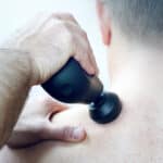 how to use a massage gun