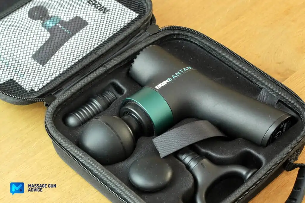 Are Massage Guns Worth It? Are Massage Guns Good for You? 13 Ekrin Bantam mini massage gun And massage gun Attachments inside an open carrying Case