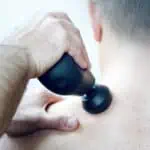 how to use a massage gun