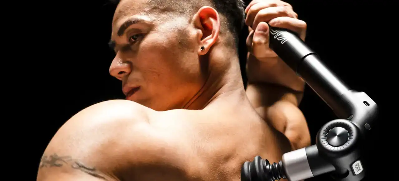 Kica Evo Massage Gun Review: upper back massage