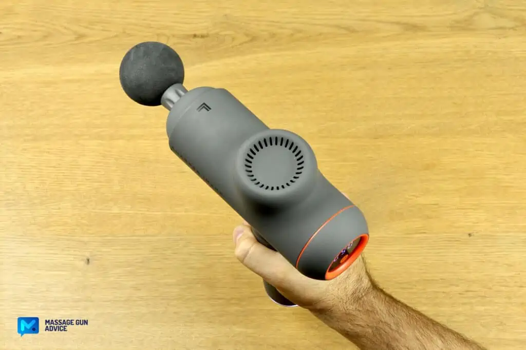 Sharper Image Massager Review – Good on the Outside but Only So-So In Performance 18 sharper image power percussion deep tissue massage held by a hand showing the top of the device