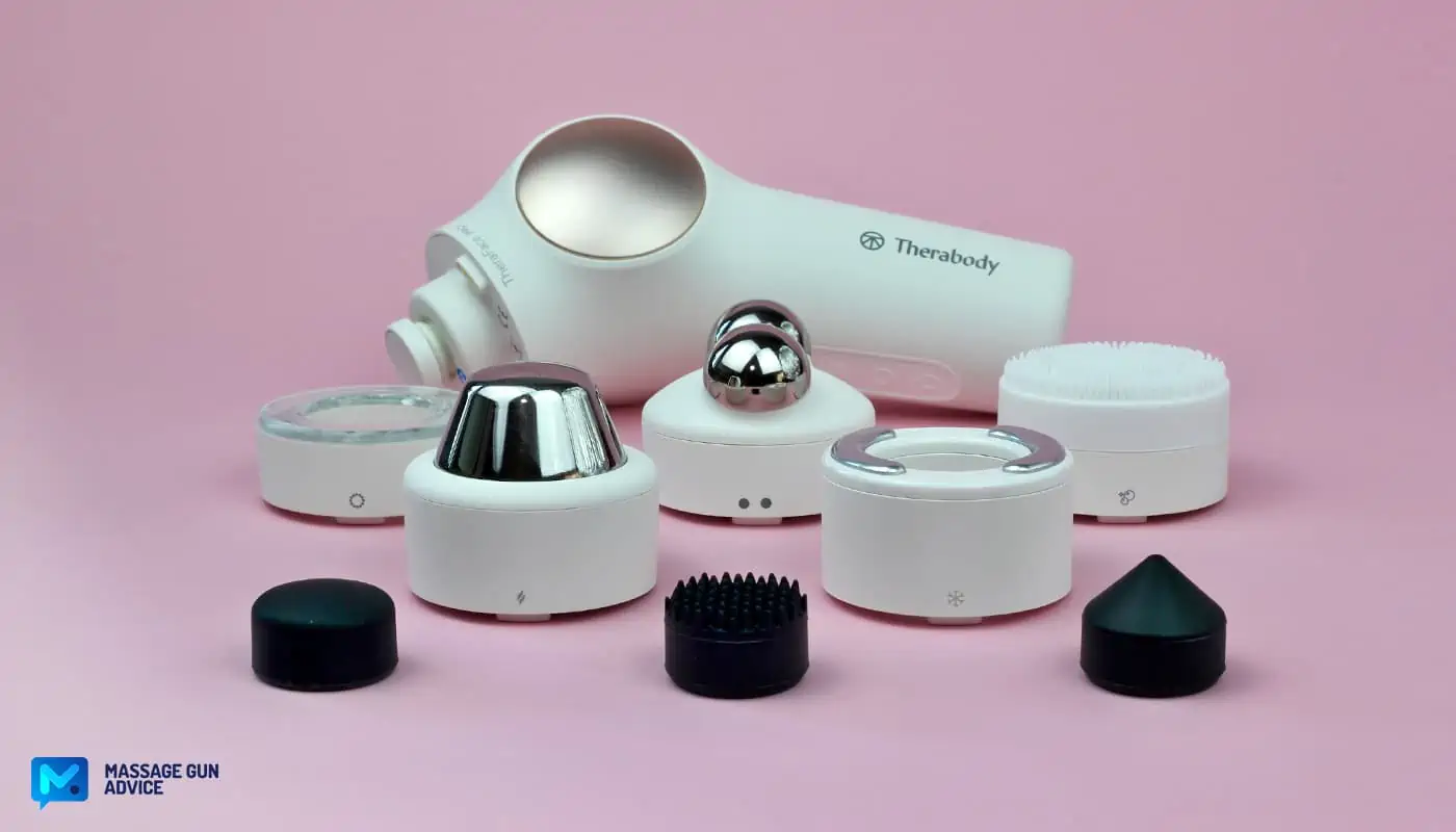 theraface pro:  thera face beauty massager, and theraface pro attachments on a pink background
