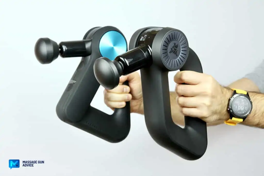 Massage Guns Made in USA - Are There Any at All? 31 a man holding two massage gun on each hand - Theragun Pro Vs Bob And Brad D6 Pro Massage Guns -
