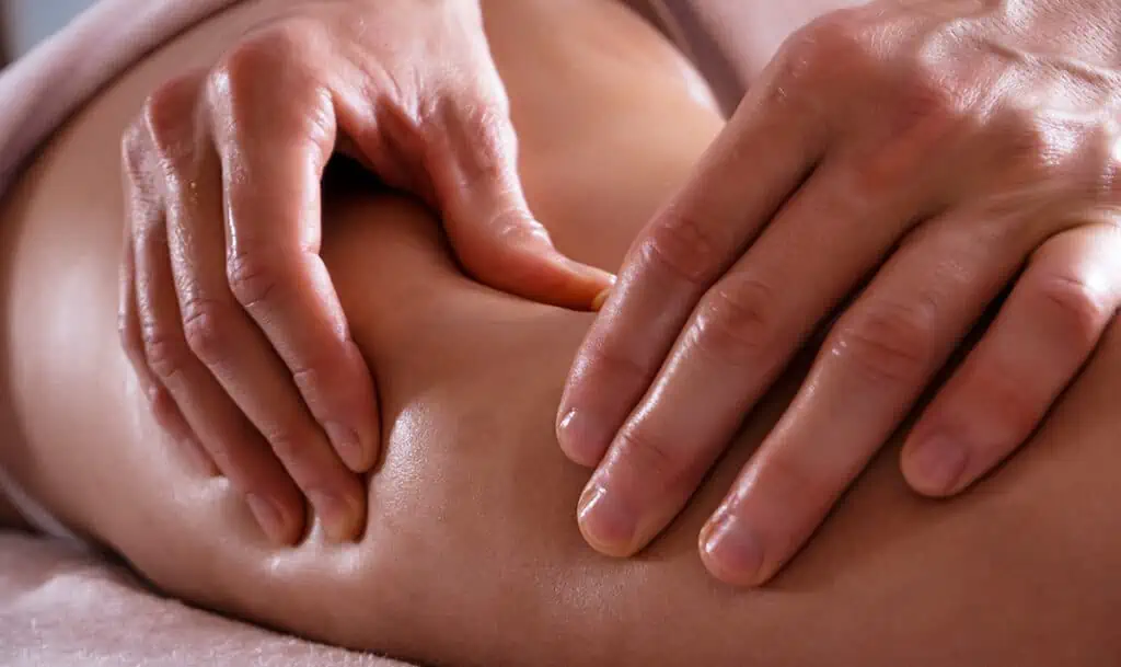 What Toxins Are Released After Massage? Demystifying Detoxification 1 what toxins are released after massage: Professional massaging a patient